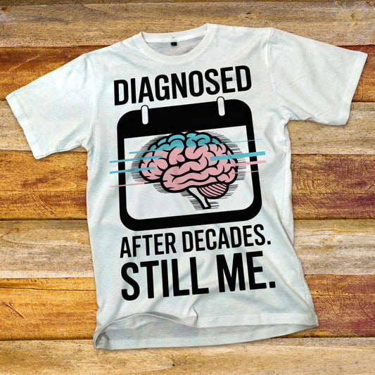 Diagnosed After Decades. Still Me. T-Shirt