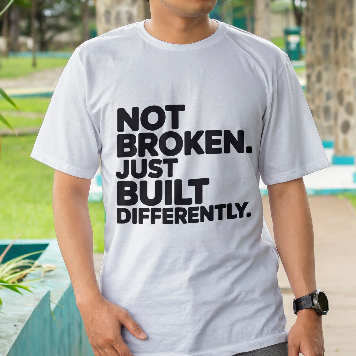 Not Broken. Just Built Differently. T-Shirt