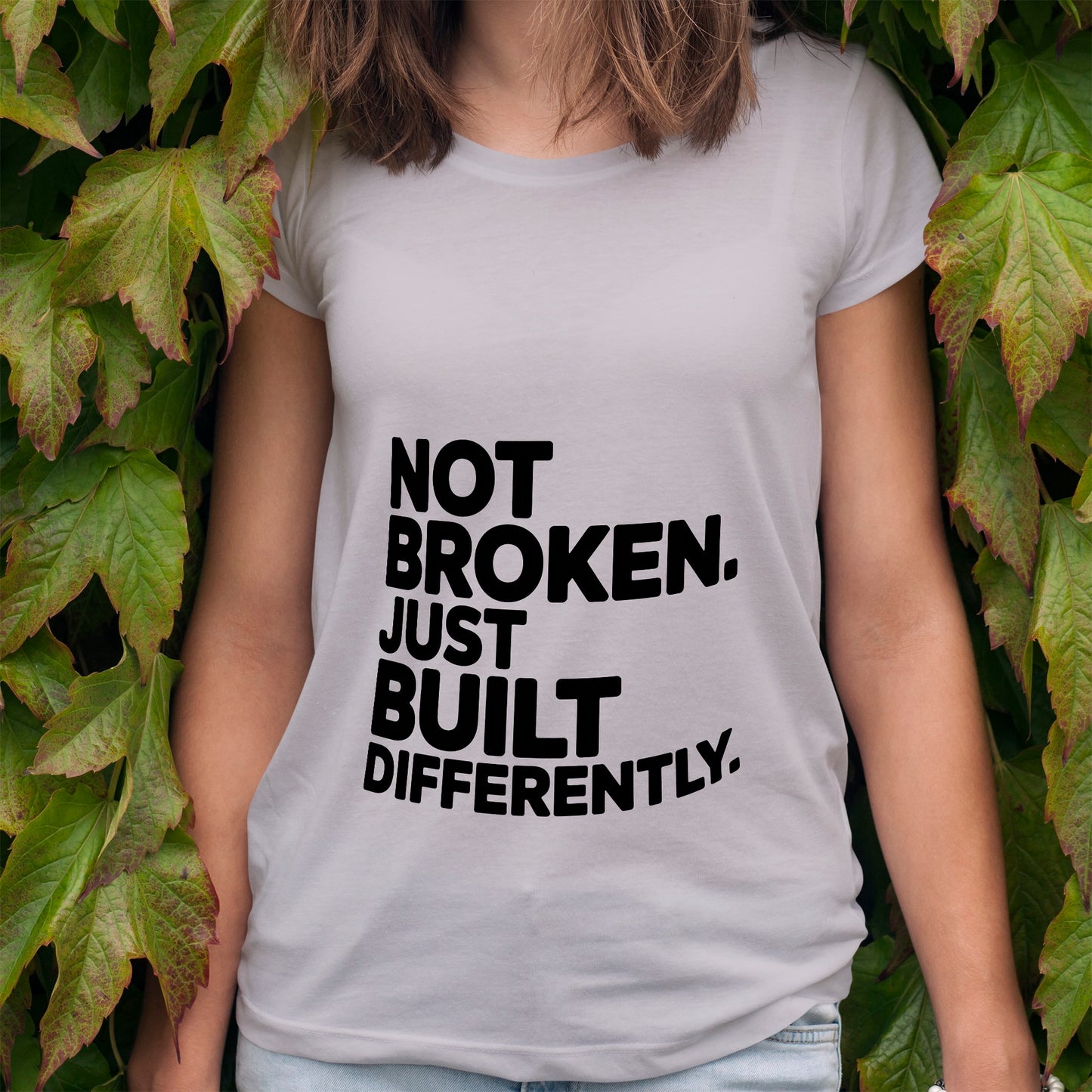 Not Broken. Just Built Differently. T-Shirt