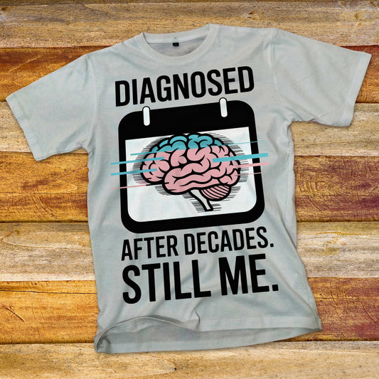 Diagnosed After Decades. Still Me. T-Shirt