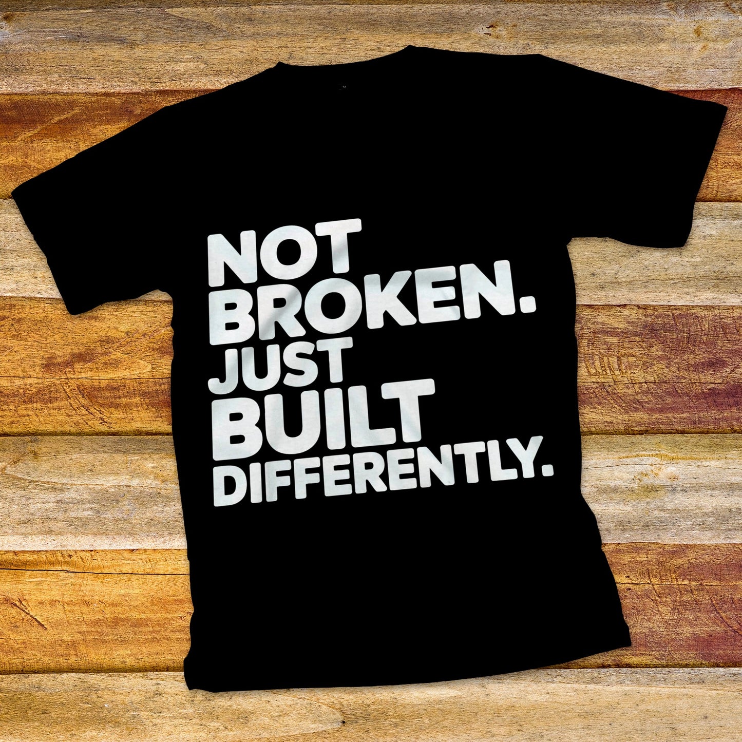 Not Broken. Just Built Differently. T-Shirt