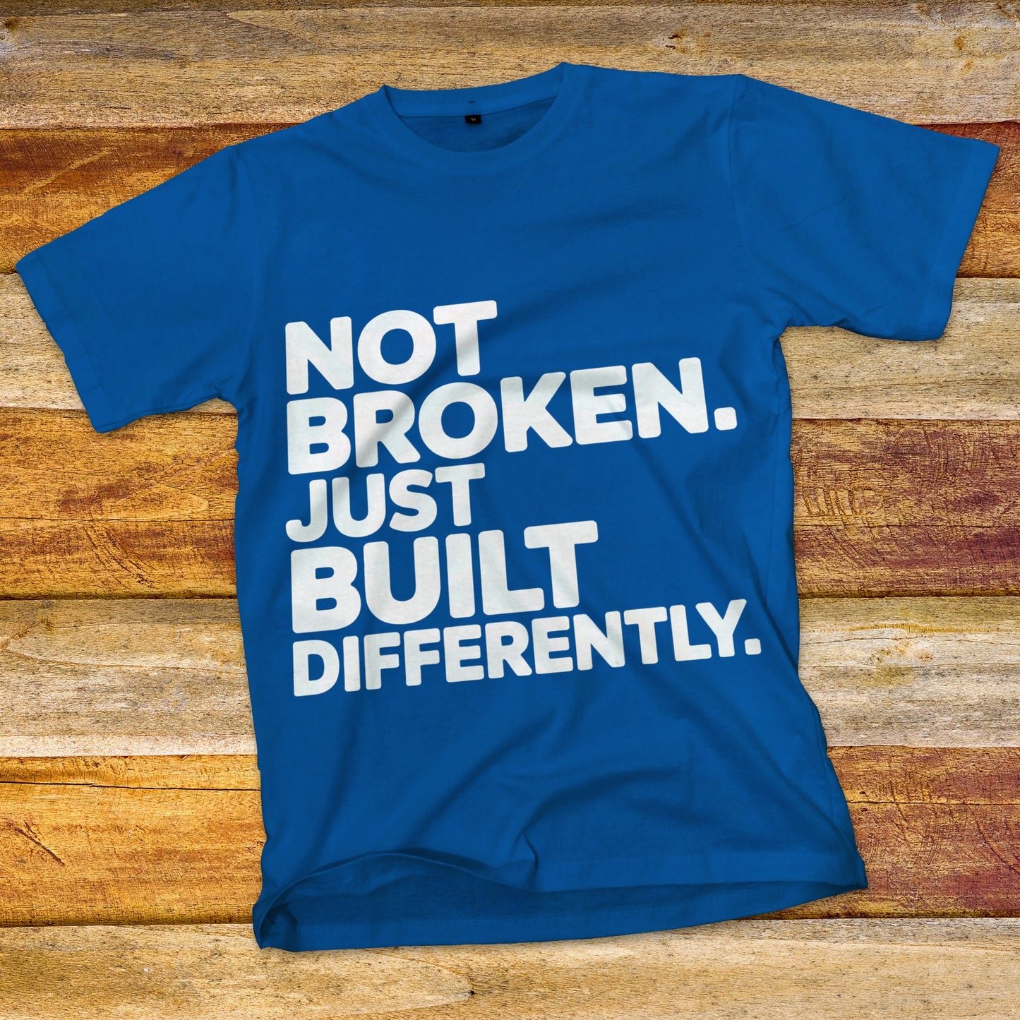 Not Broken. Just Built Differently. T-Shirt