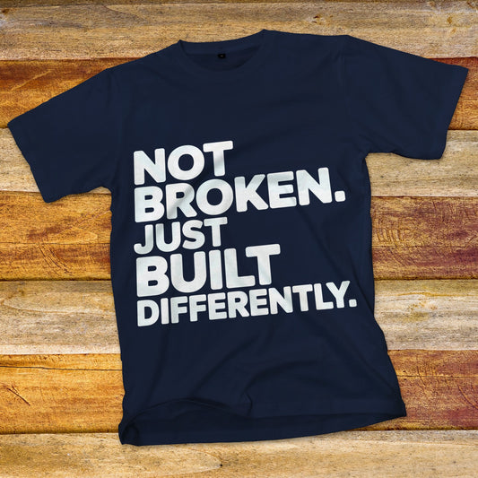 Not Broken. Just Built Differently. T-Shirt